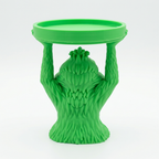 Green Grumpy Guy candle holder rear view on a white background