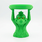 Green Grumpy Guy candle holder front view on a white background